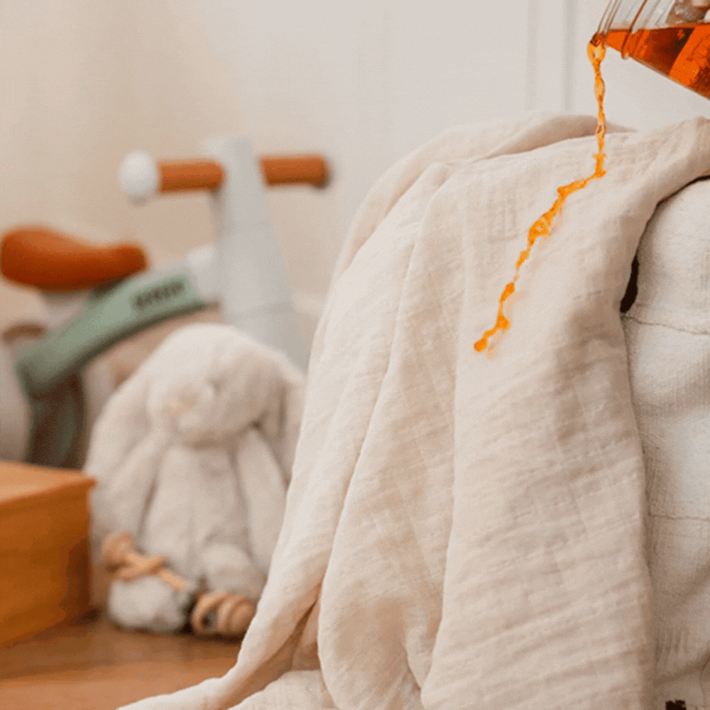 liquid rolling off a fabric protected baby blanket