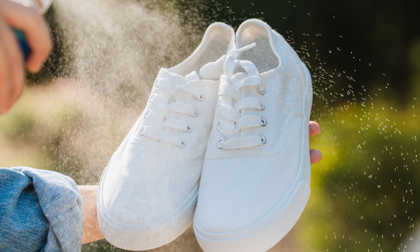 white shoes being sprayed by ProofPlus Shoe Fabric Protector