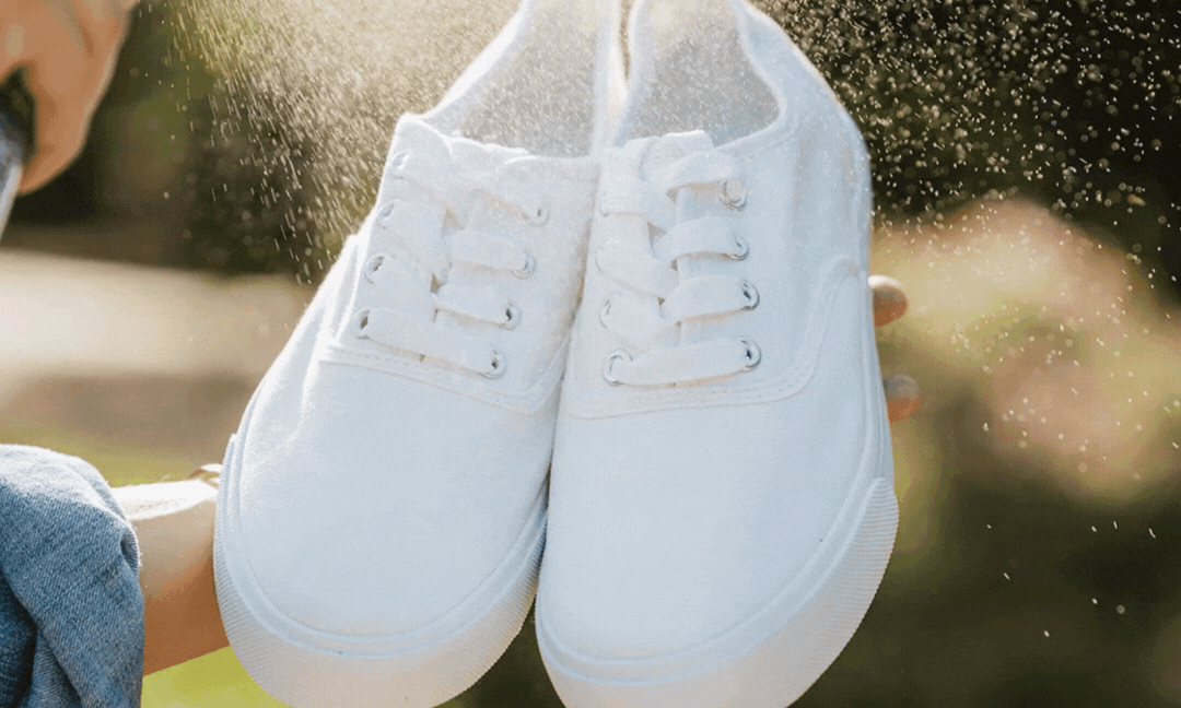 white shoes being sprayed by ProofPlus Shoe Fabric Protector